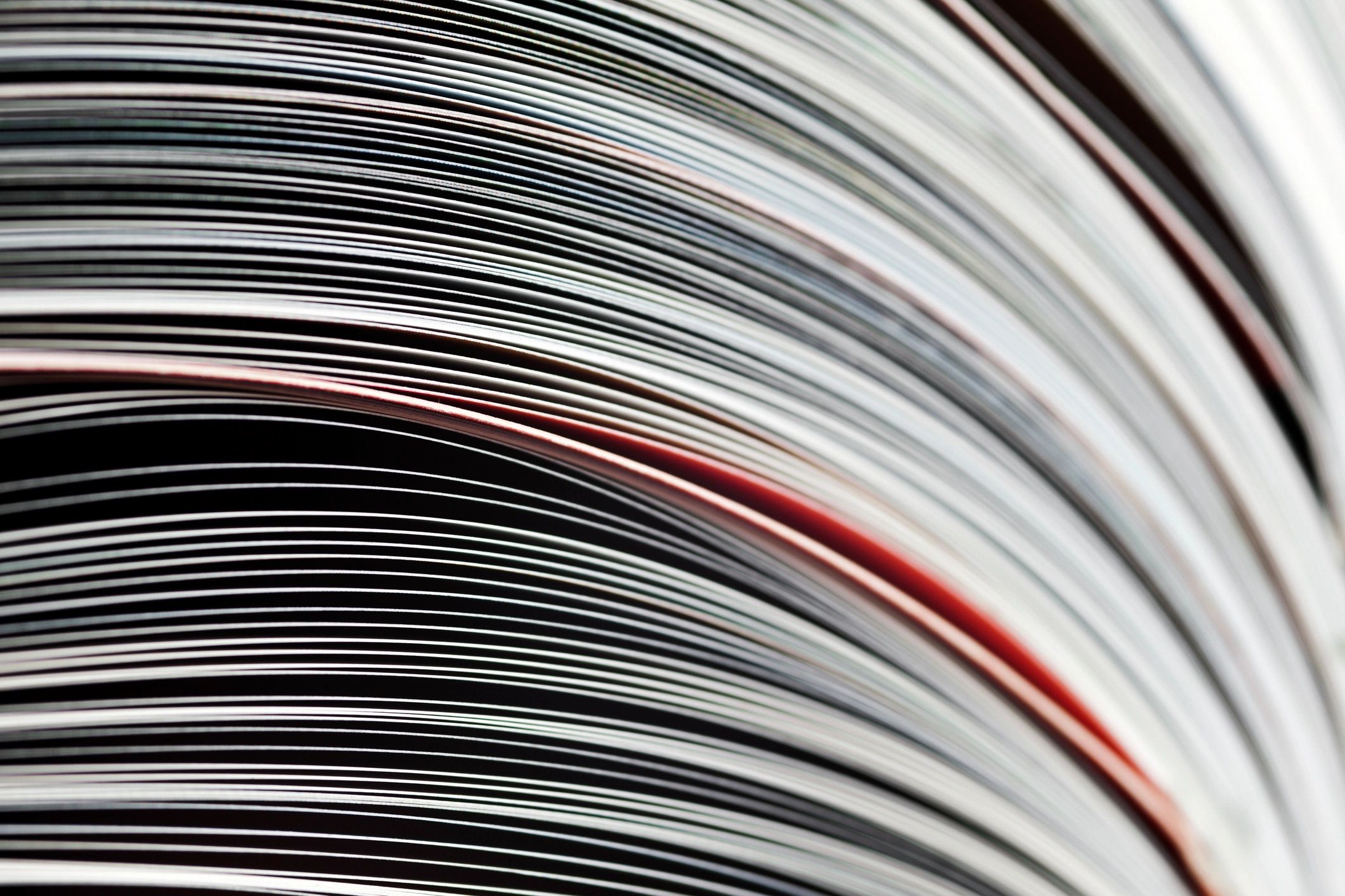 Open magazines close up on a table