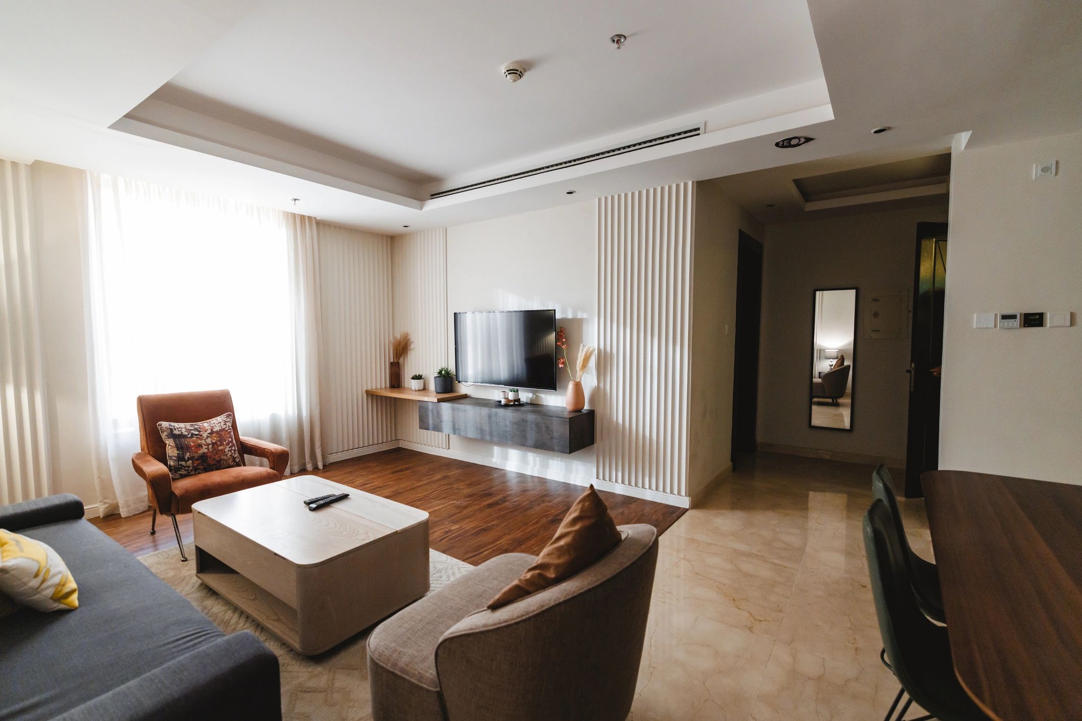 Neat modern hotel room with elegant furnishings